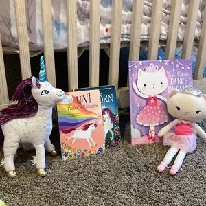 Uni the unicorn with books and tie tie sweets dance dreams with cat stuff animal